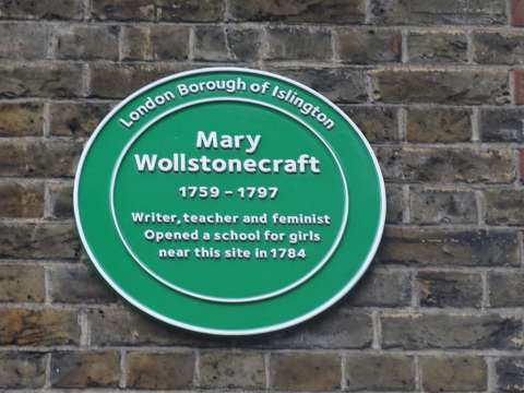 Green plaque on Newington Green Primary School, near the site of a school that Wollstonecraft, her sisters (Everina and Eliza), and Fanny Blood set up; the plaque was unveiled in 2011.