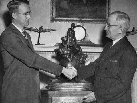Receiving the Collier Trophy from President Harry Truman, White House, 1946