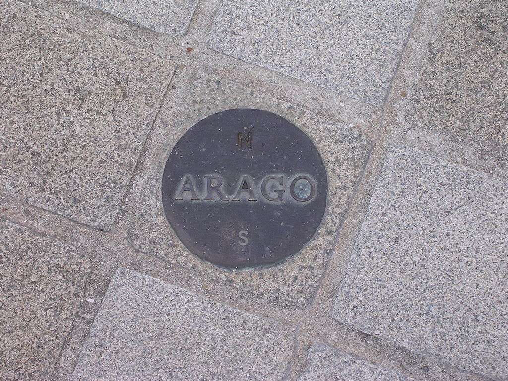 One of the 135 Arago medallions set along the Paris Meridian for 9.2 km (6 mi), in memorial to Arago and his work on the meridian and his measurements of the Earth.