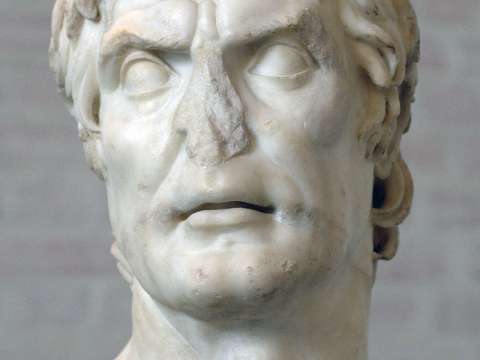 Dictator Lucius Cornelius Sulla stripped Caesar of the priesthood.