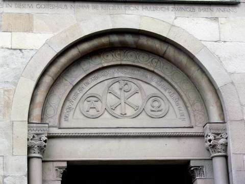 Above the entrance to the Grossmünster doors is inscribed Matthew 11:28, 