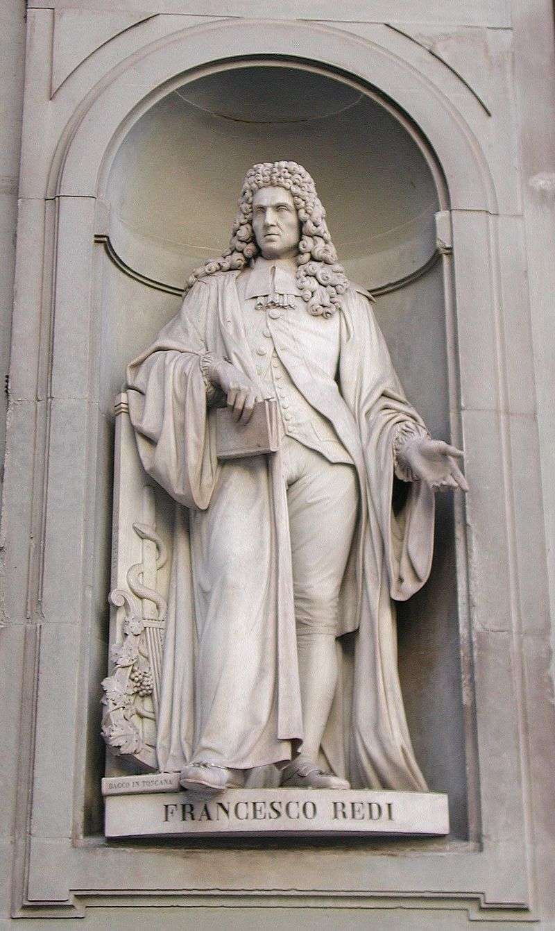 Statue of Francesco Redi on the Uffizi Gallery (Piazzale degli Uffizi) in Florence. At his feet is a copy of Bacco in Toscana