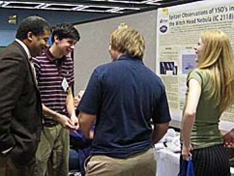 Tyson with students at the 2007 American Astronomical Society conference