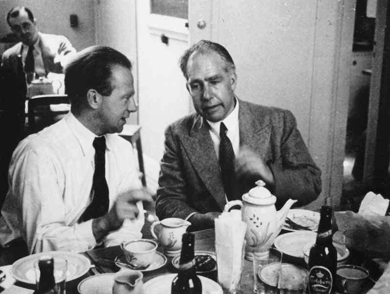 Werner Heisenberg (left) with Bohr at the Copenhagen Conference in 1934